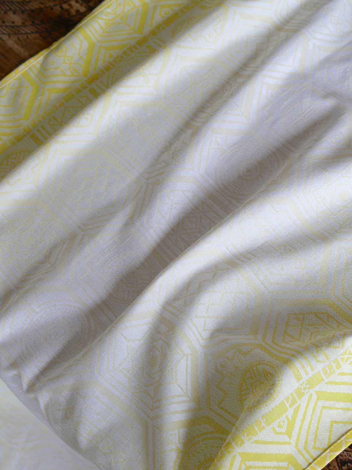Yellow fabric with geometric pattern