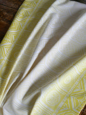 Yellow fabric with geometric pattern