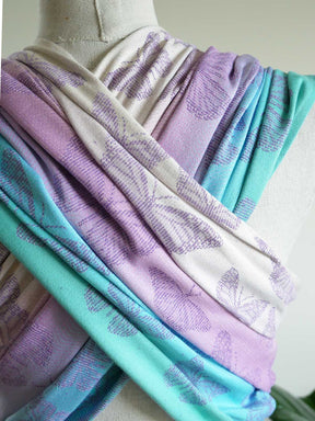 Close-up of fabric in pastel colors on a mannequin.