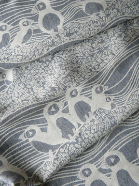 Close-up of patterned fabric with bird design