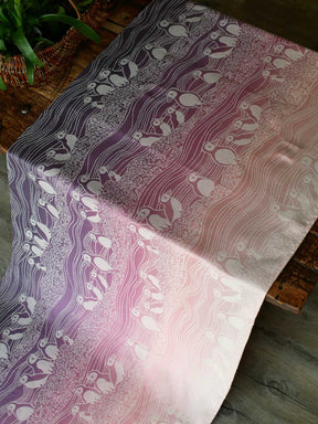 Pink and purple fabric with puffin pattern