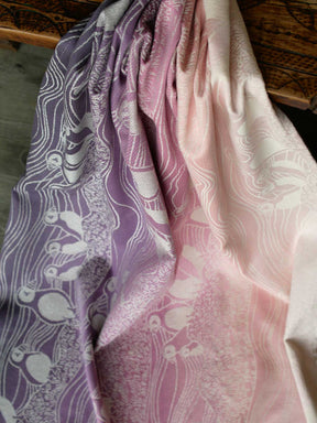 Pink and purple fabric with puffin pattern