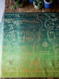 Green fabric with Middle-earth map design