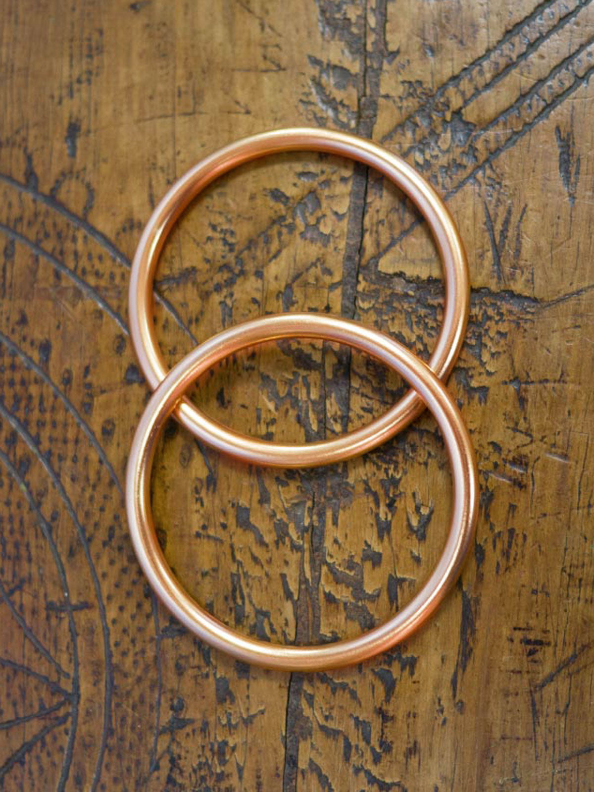 Rose gold sling rings on sale