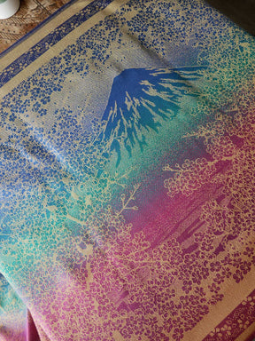 Reverse of fabric with a colourful pattern on a textured surface