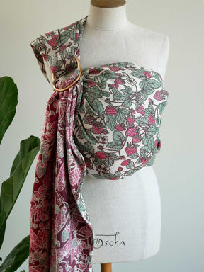 Rng sling on a mannequin with a strawberry pattern.