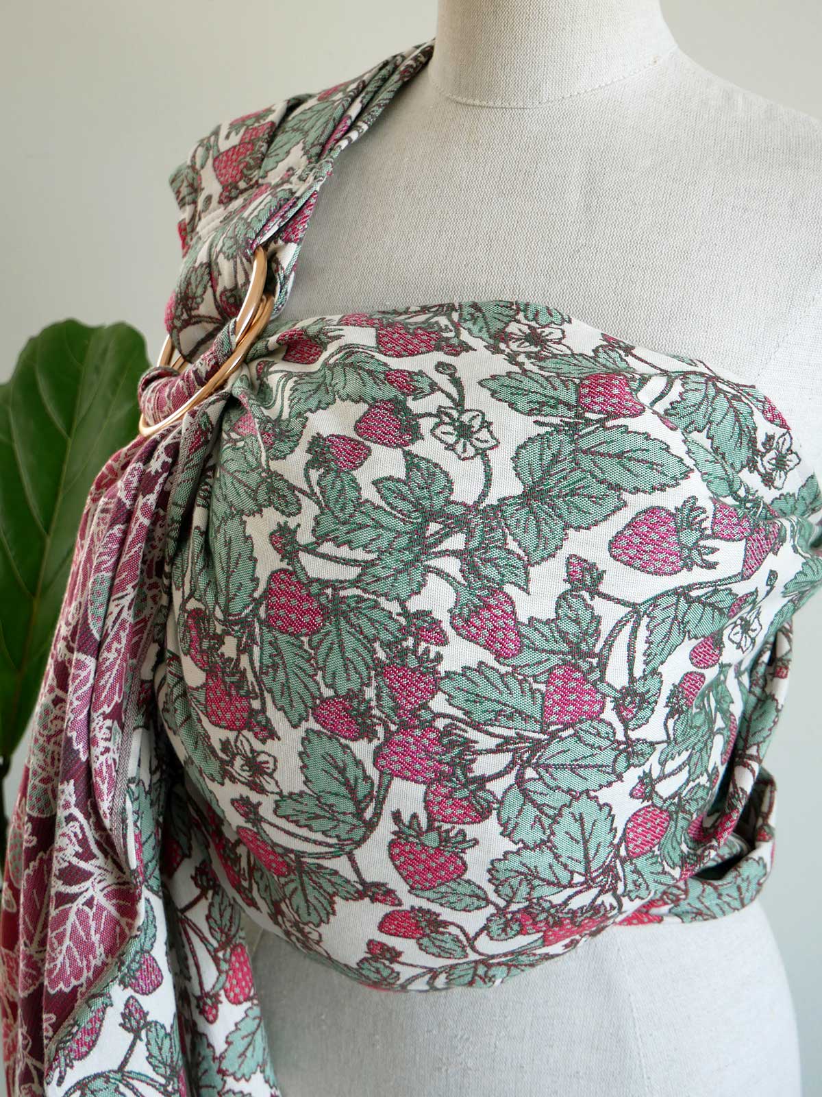 Ring slingwith strawberry pattern on a mannequin