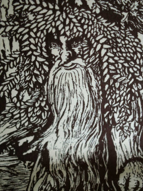 Close up of a brown throw with Treebeard design