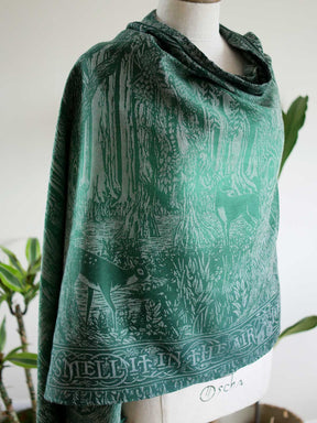 View of the scarf modelled as a shawl on the mannequin. 