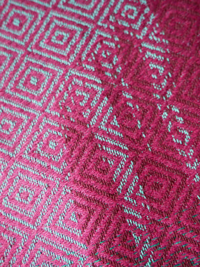 Close up of a pinky red fabric