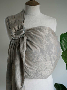 Neutral  textured ring sling on a mannequin with a plain background