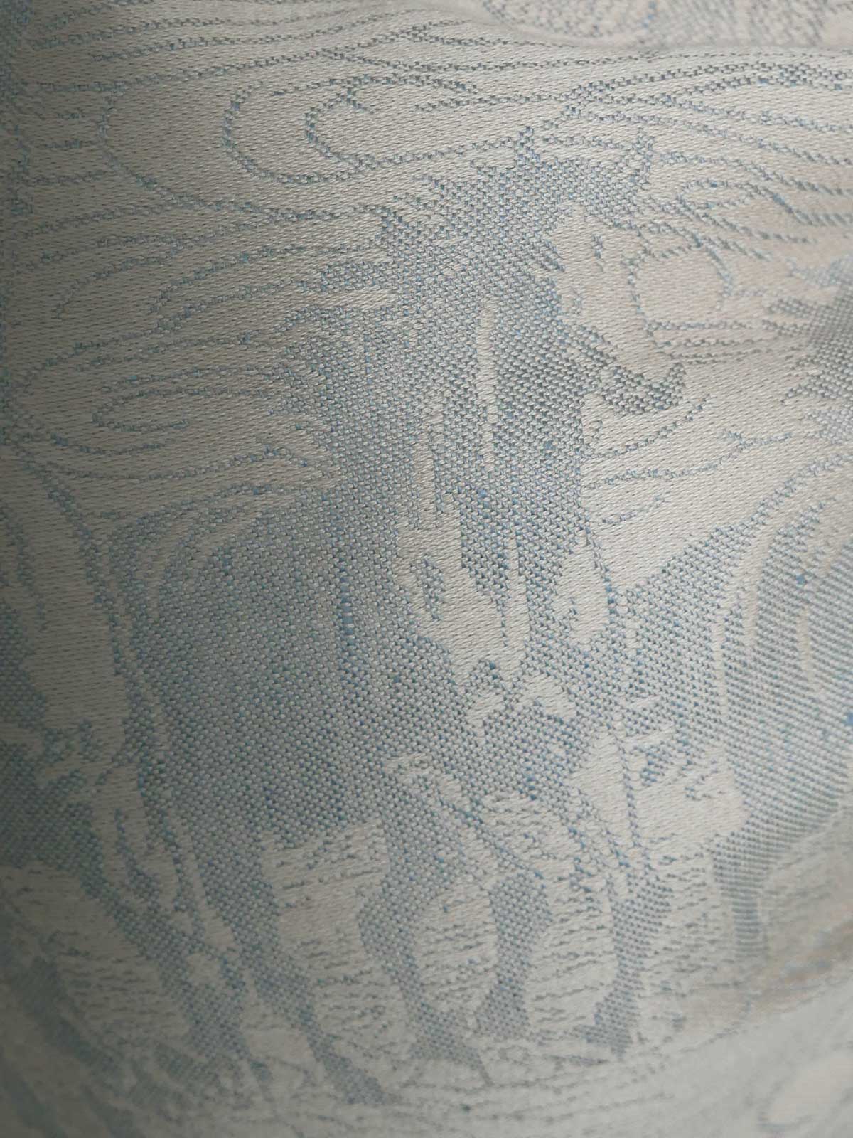 Textured fabric with a subtle horse pattern in neutral tones
