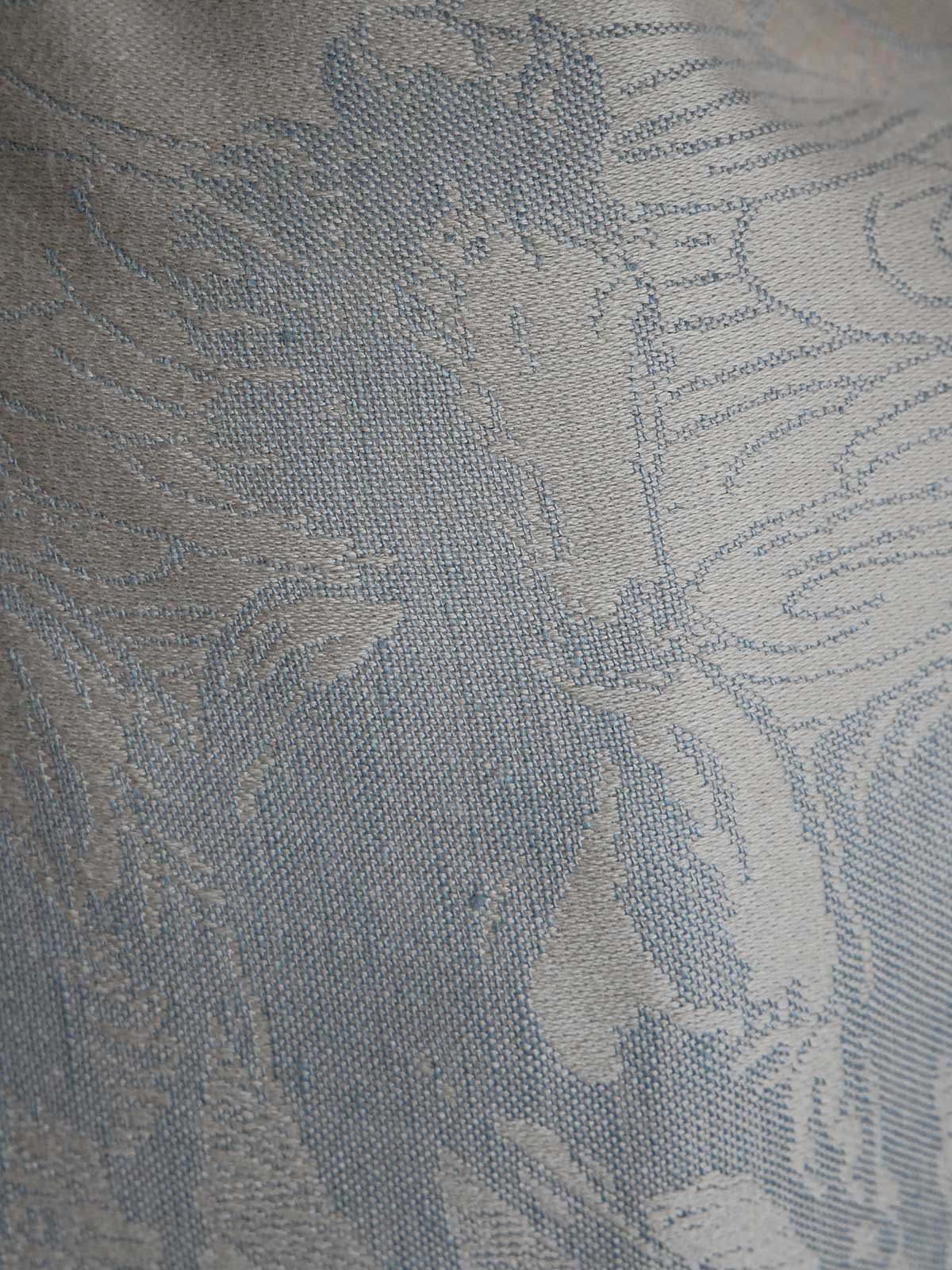 Textured fabric with a subtle pattern on a neutral background