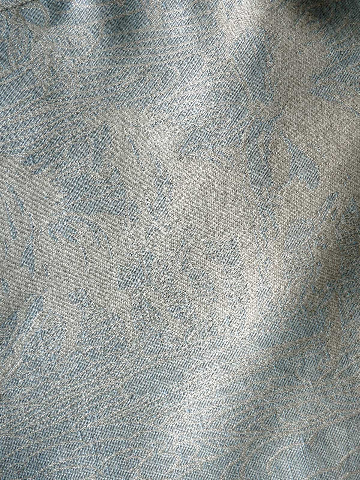 Reverse of neutral toned fabric