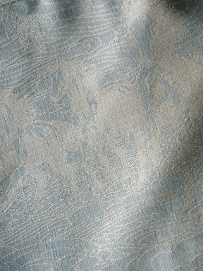 Reverse of neutral toned fabric