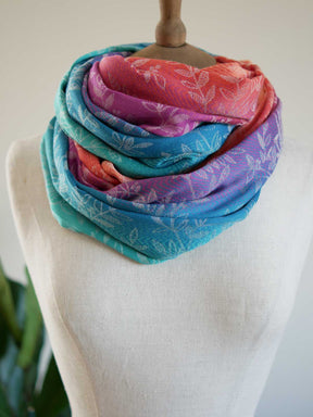 Colorful scarf on a mannequin with a white background