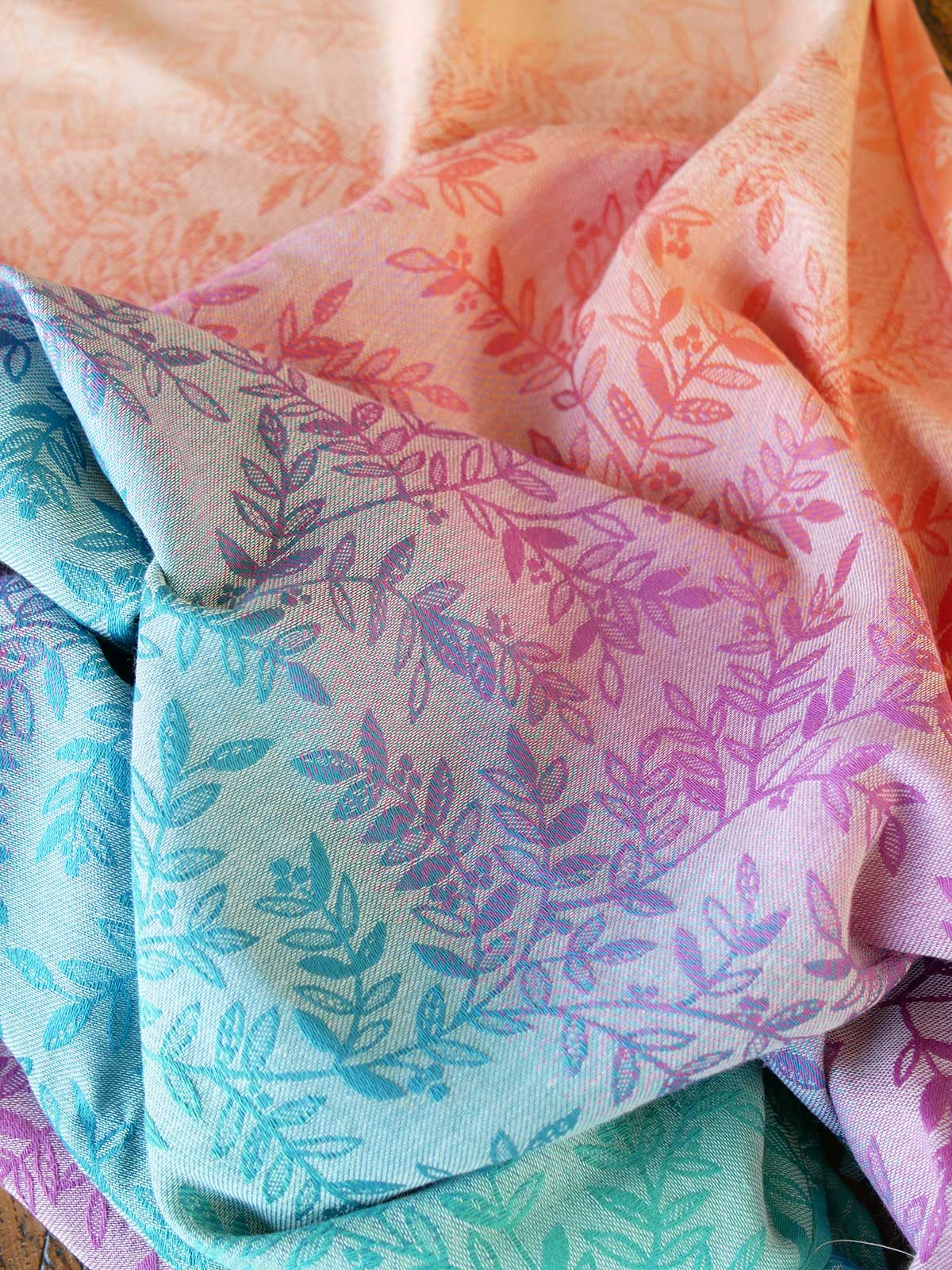 Stack of fabric with colorful leaf pattern