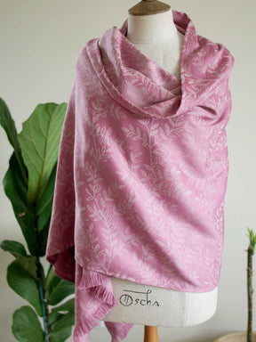 Pink scarf with a willow leaf pattern on a mannequin