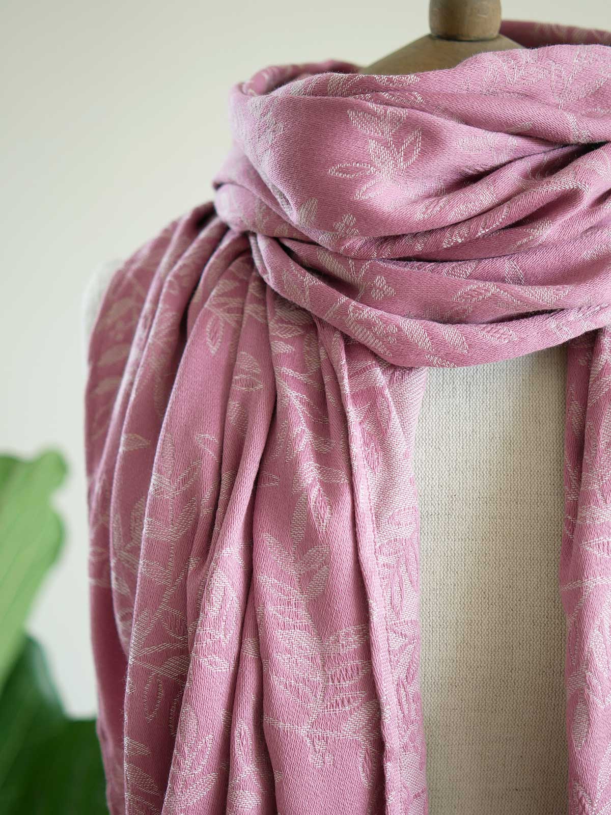 Pink scarf with a willow leaf pattern on a mannequin