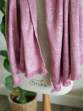 Pink scarf with a willow leaf pattern and fringing