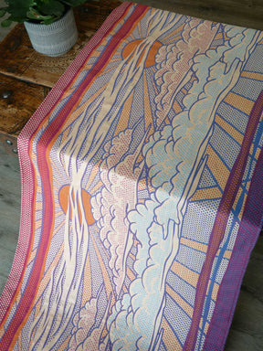 Pop Art with a sunset design in bold colours on a wooden surface