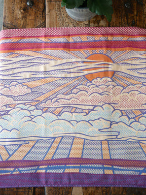 Pop Art with a sunset design in bold colours on a wooden surface