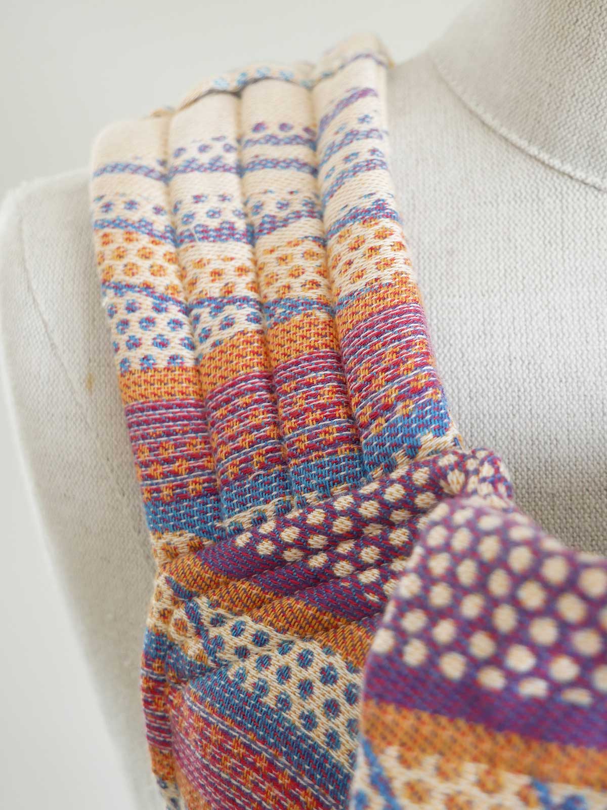 Colorful patterned straps on a mannequin