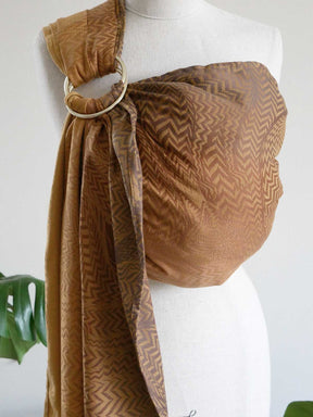 Zorro Butterscotch Ring Sling on a mannequin with a white background